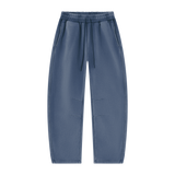 MIROLYUB Arc Vintage-Wash Barrel Fleece Pants in Washed Blue, front view.