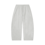MIROLYUB Tessera waffle barrel pants in Oat Gray, front view.