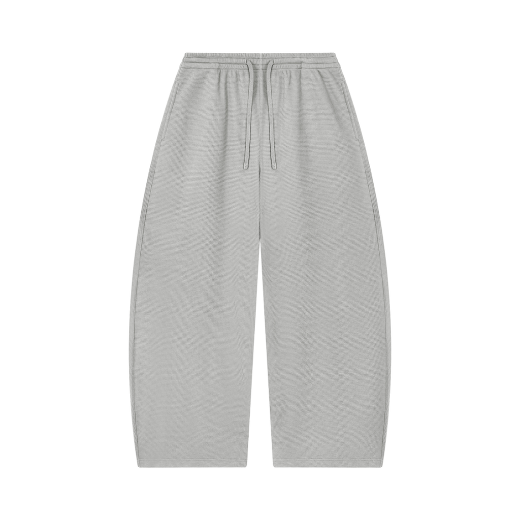 MIROLYUB Tessera waffle barrel pants in Light Gray, front view.