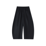 MIROLYUB Contour barrel dress trousers in Black, front view.