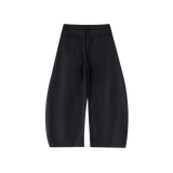 MIROLYUB Contour barrel dress trousers in Black, back view.