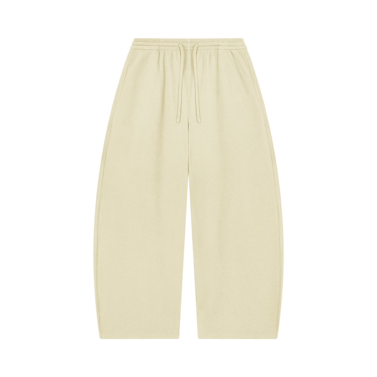 MIROLYUB Tessera waffle barrel pants in Apricot, front view.