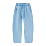 MIROLYUB Arc Vintage-Wash Barrel Fleece Pants in Light Blue, front view.