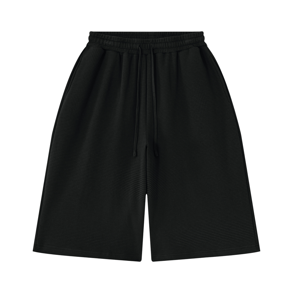 MIROLYUB Lattice Waffle Shorts in Black, front view.