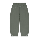 MIROLYUB Trace Piping Barrel Fleece Pants in Medium Gray, back view.