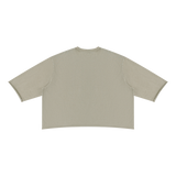 MIROLYUB Undertone Mineral-Wash Raw-Hem Tee in Apricot, back view.