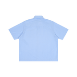 MIROLYUB Margin Striped Boxy Shirt in Blue, back view.
