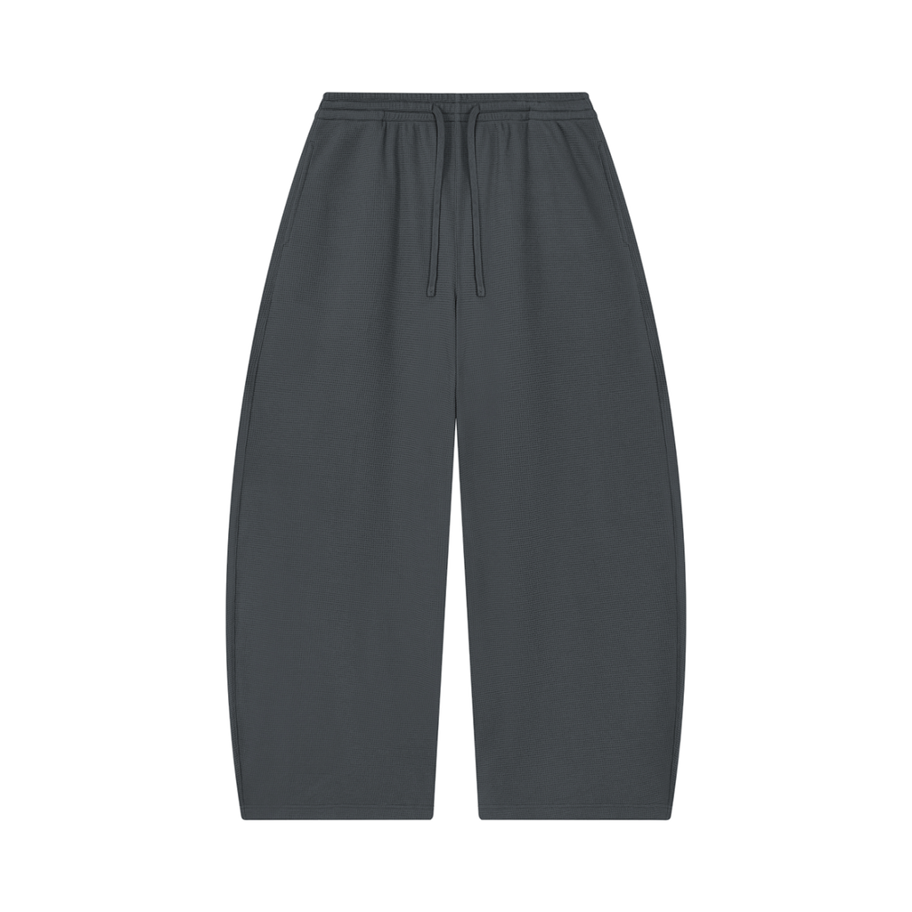 MIROLYUB Tessera waffle barrel pants in Dark Gray, front view.