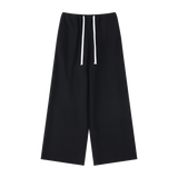 MIROLYUB Cascade wide-leg drawstring pants in Black — front view