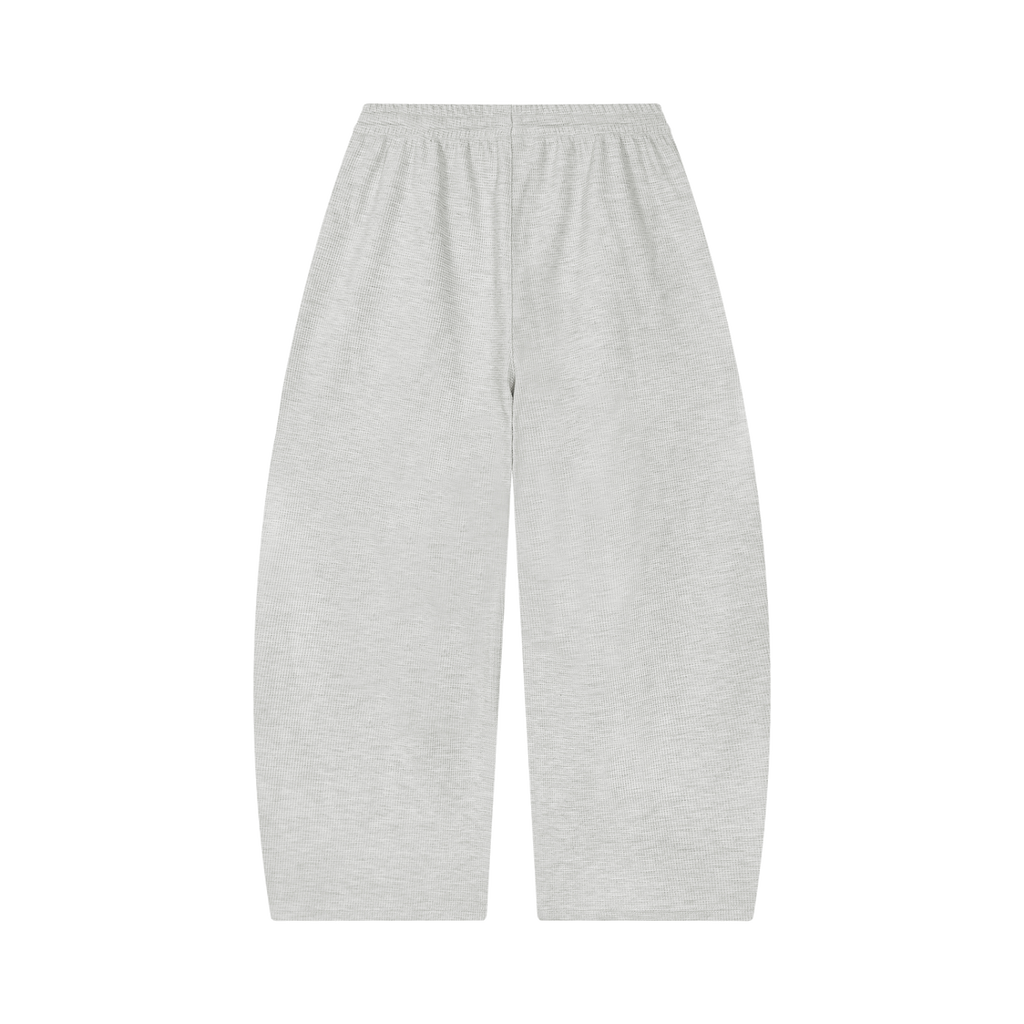 MIROLYUB Tessera waffle barrel pants in Oat Gray, back view.