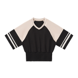Gather — Black with Apricot — front view
