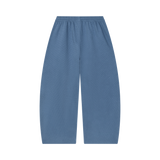 MIROLYUB Tessera waffle barrel pants in Jeans Blue, back view.