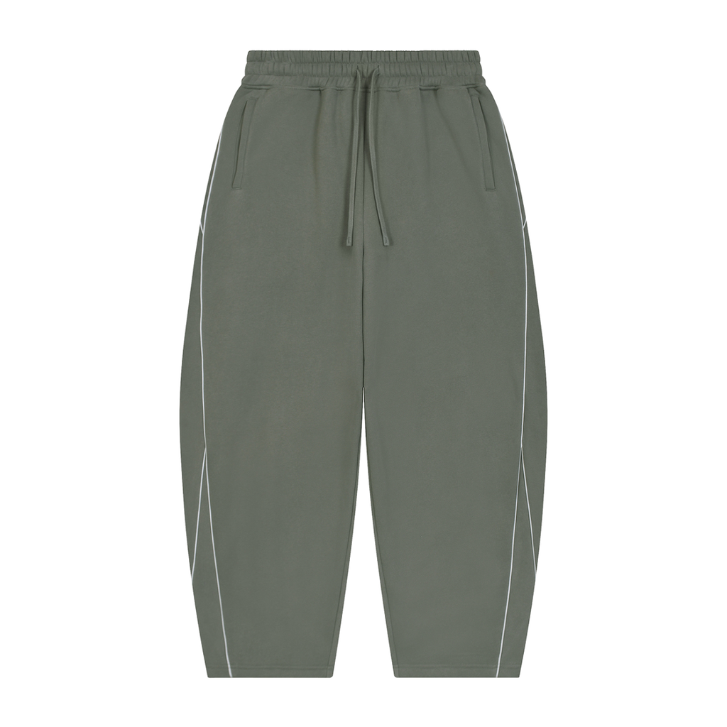 MIROLYUB Trace Piping Barrel Fleece Pants in Medium Gray, front view.