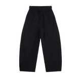 MIROLYUB Drift pants in Black, front view with wide legs, tonal panels and a drawstring waist