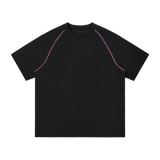 MIROLYUB Offbeat raglan tee in black, front view with purple contrast stitching and an unprinted chest