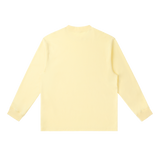 MIROLYUB Continuum cotton-blend long sleeve in Yellow Cream, back view.