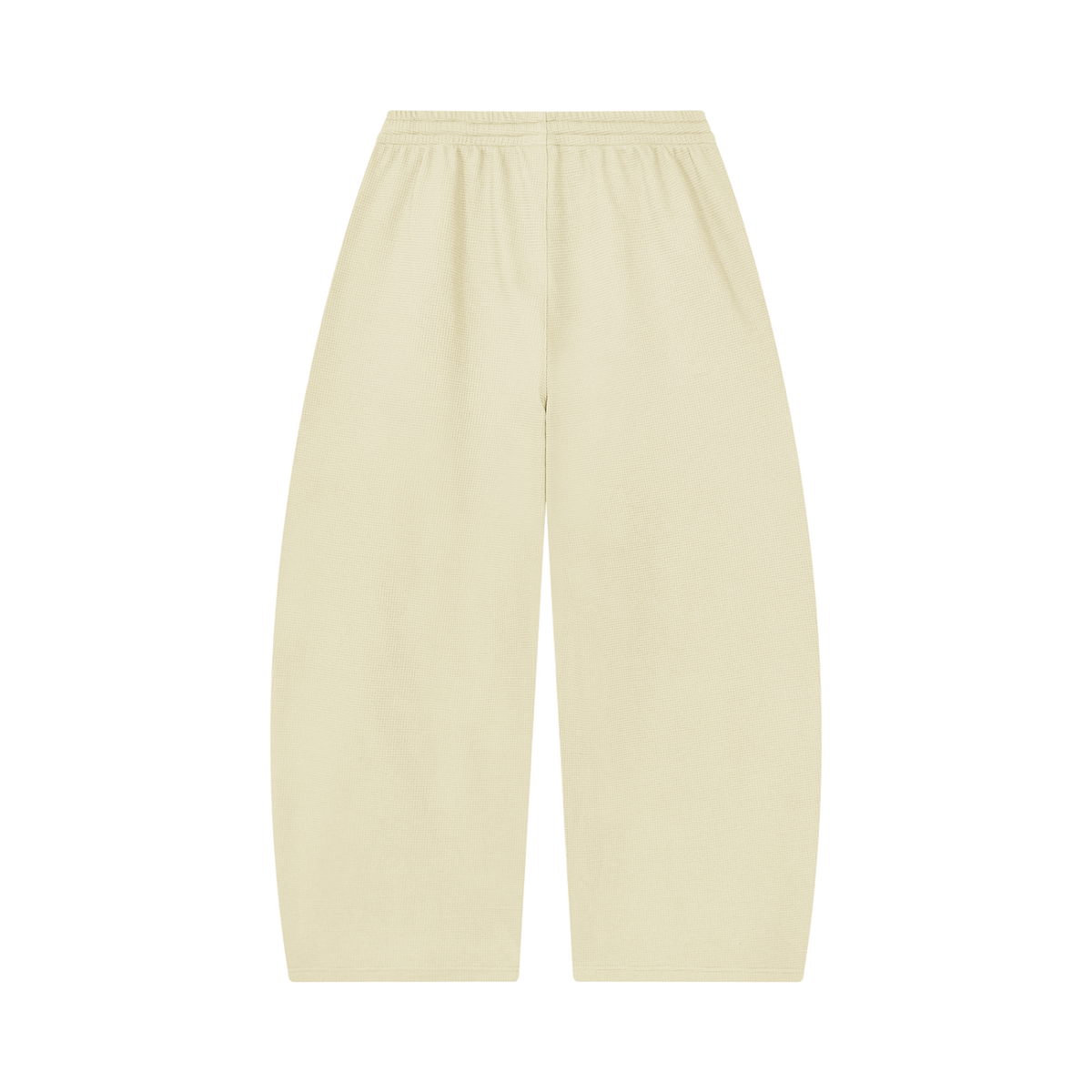 MIROLYUB Tessera waffle barrel pants in Apricot, back view.