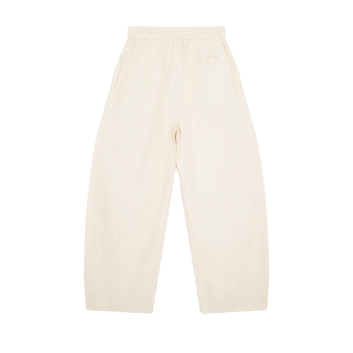 MIROLYUB Drift pants in Mild Apricot, back view with wide legs and an elasticated waist