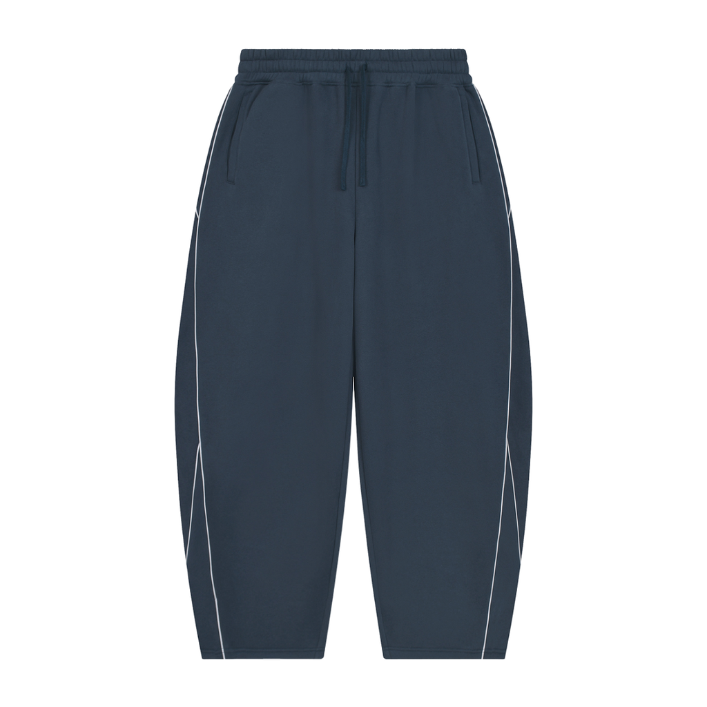 MIROLYUB Trace Piping Barrel Fleece Pants in Navy Blue, front view.