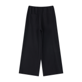 MIROLYUB Cascade wide-leg drawstring pants in Black — back view