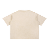 MIROLYUB Stratum Mineral-Wash Boxy Tee in Light Apricot, back view