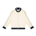 MIROLYUB Switchback raglan track jacket in Mild Apricot, front view.