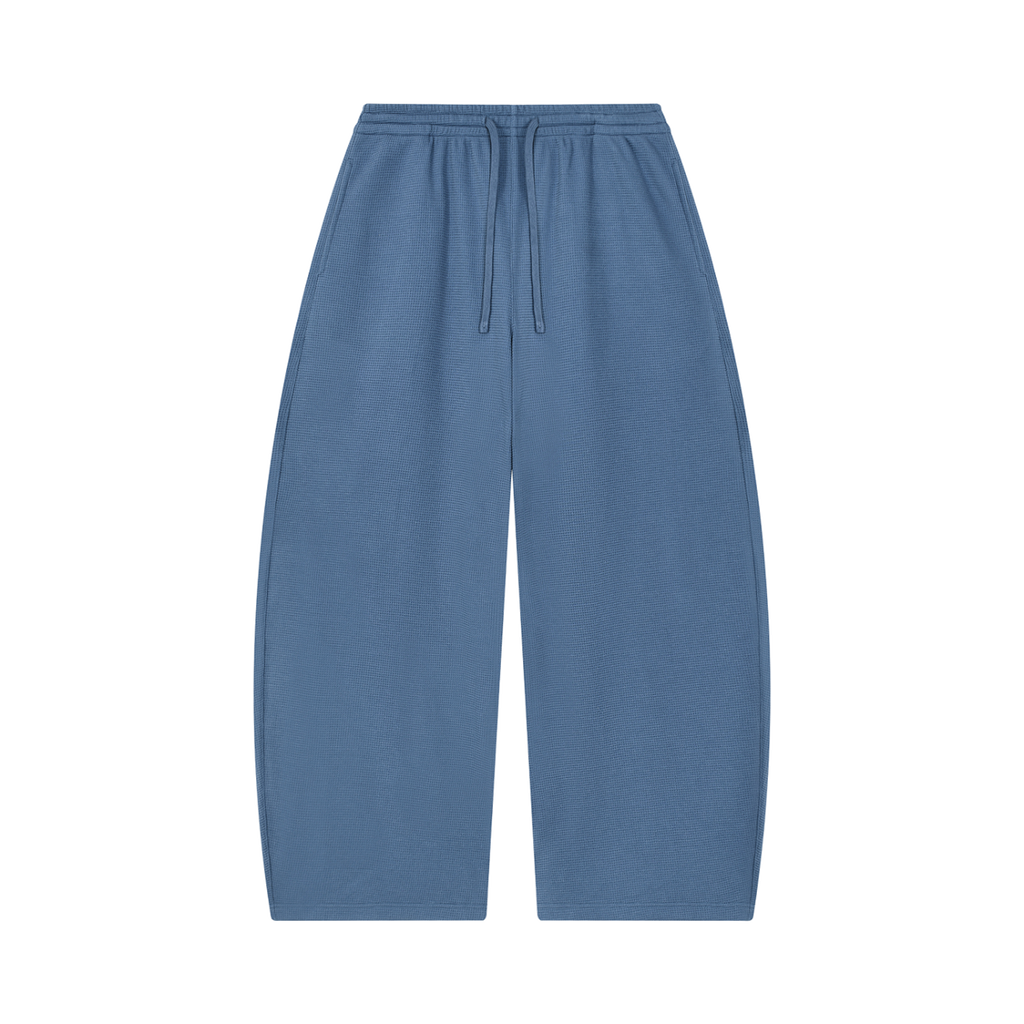 MIROLYUB Tessera waffle barrel pants in Jeans Blue, front view.