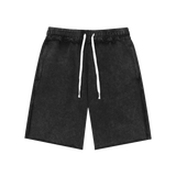 MIROLYUB Unisex Mineral Wash Raw Edge Shorts — Black, front view