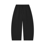 MIROLYUB Tessera waffle barrel pants in Black, front view.
