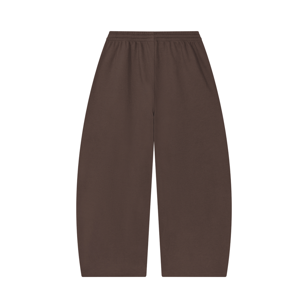 MIROLYUB Tessera waffle barrel pants in Coffee, back view.