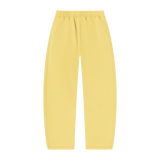 MIROLYUB arc vintage-wash barrel fleece pants in Light Yellow, back view