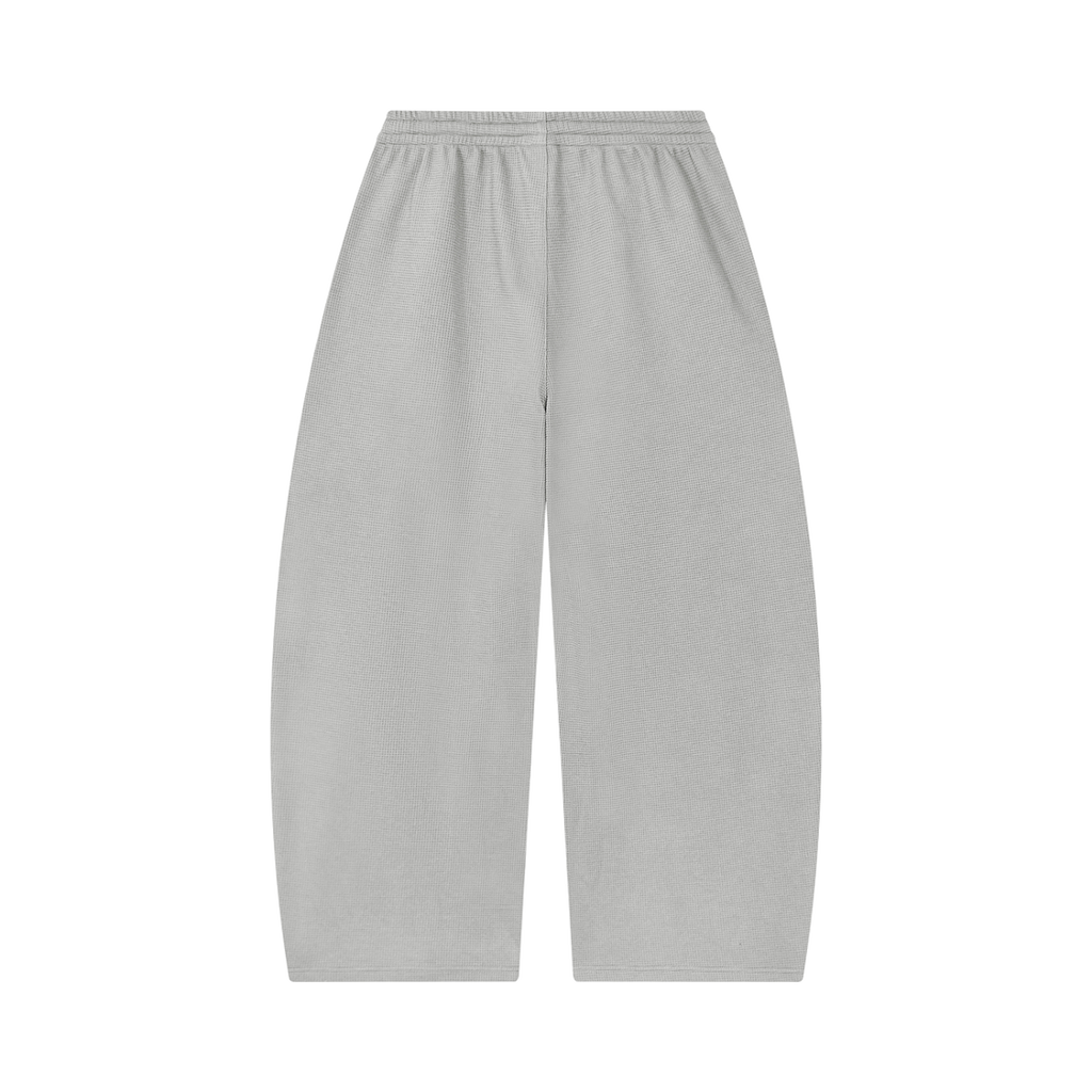 MIROLYUB Tessera waffle barrel pants in Light Gray, back view.