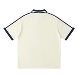 Traction contrast-piping polo in Apricot, back view