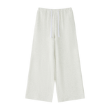 MIROLYUB Cascade wide-leg drawstring pants in Oat Gray — front view