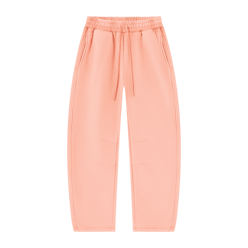 MIROLYUB Arc Vintage-Wash Barrel Fleece Pants in Light Pink, front view.