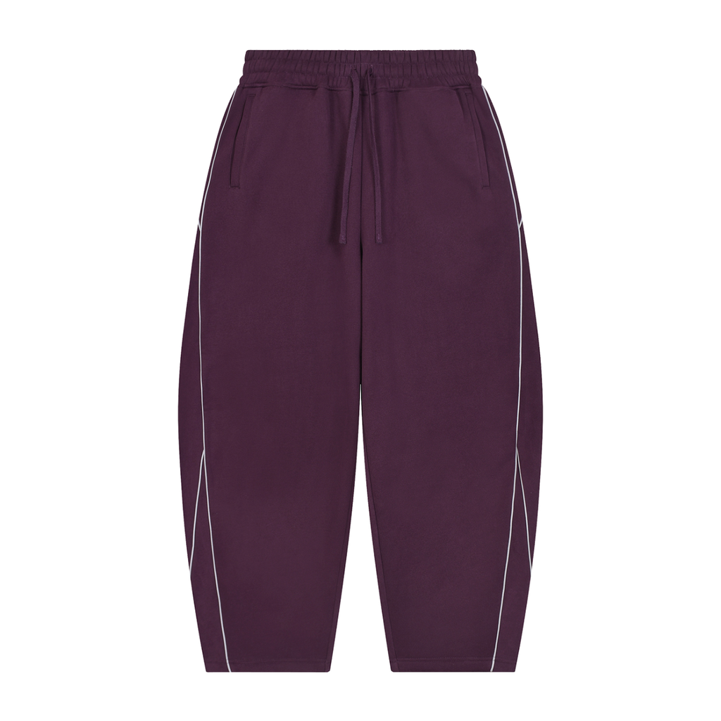 MIROLYUB Trace Piping Barrel Fleece Pants in Plum Purple, front view.