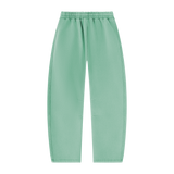 MIROLYUB arc vintage-wash barrel fleece pants in Mint Green, back view