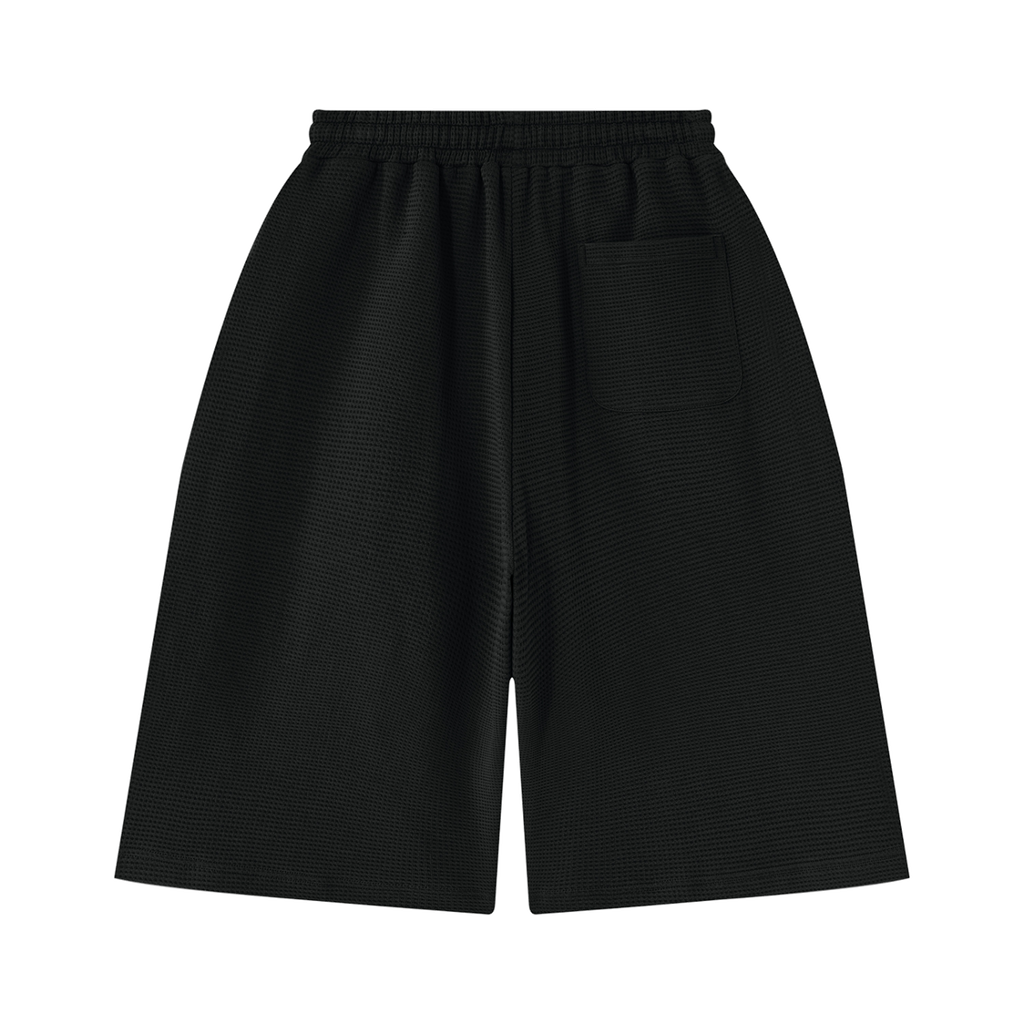 MIROLYUB Lattice Waffle Shorts in Black, back view.