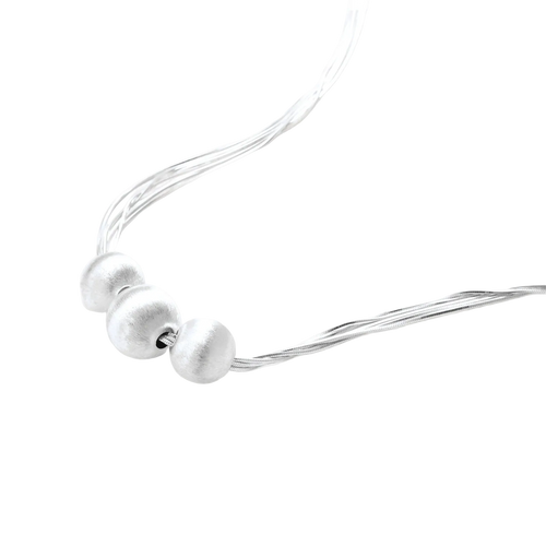 Angled detail of Borislav necklace showing three brushed sterling silver beads and polished chains