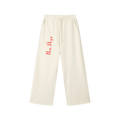 Front view of Mild Apricot drawstring sweatpants with red New York Cyrillic lettering