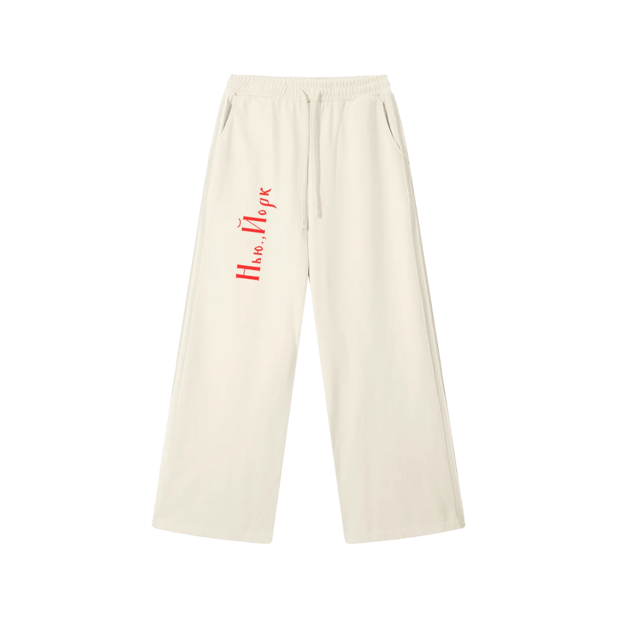 Front view of Mild Apricot drawstring sweatpants with red New York Cyrillic lettering