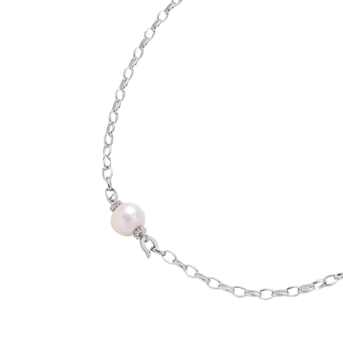 Angled detail of Mira necklace showing a freshwater pearl between pavé rondelles and silver oval links