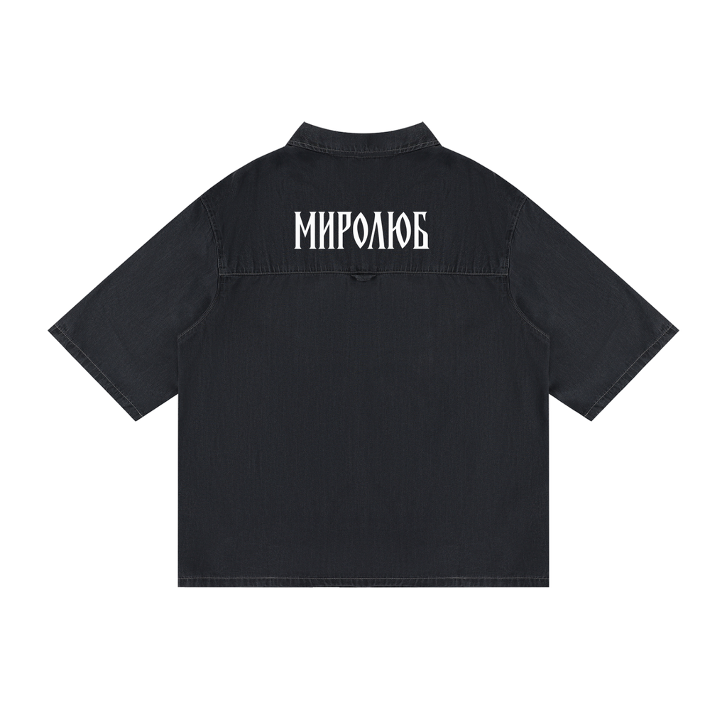 Back view of washed black short-sleeve lyocell shirt with white MIROLYUB Cyrillic wordmark