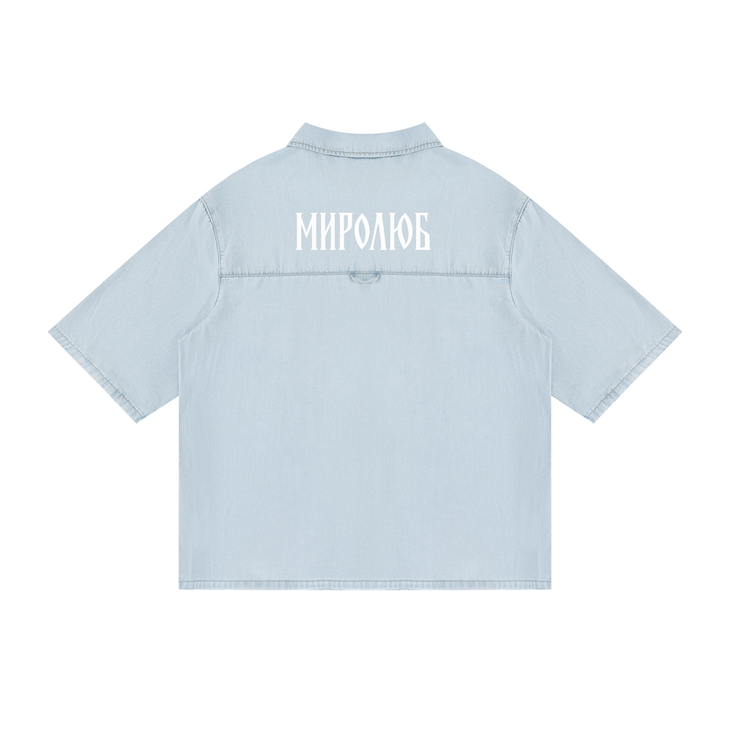 Back view of light blue short-sleeve lyocell shirt with white MIROLYUB Cyrillic wordmark