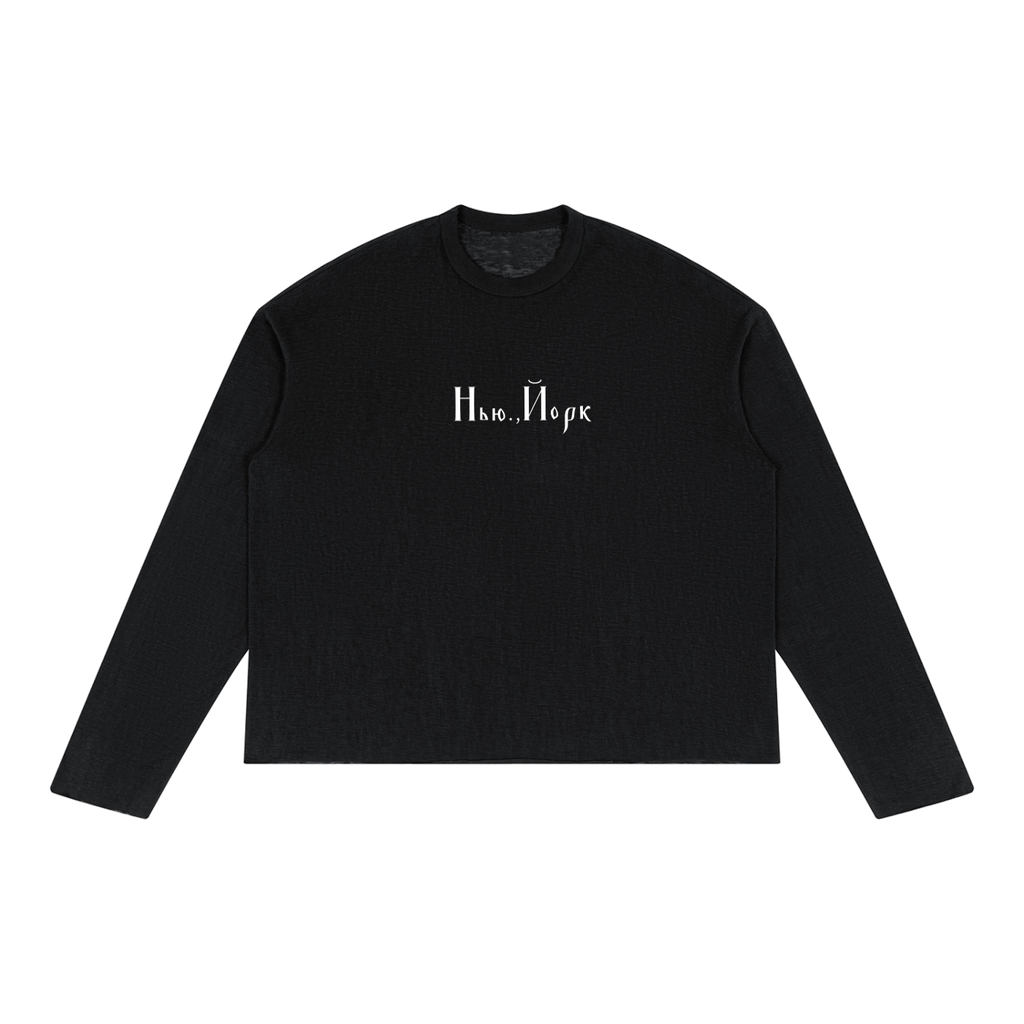 Front view of black raw-edge long sleeve with white New York Cyrillic lettering