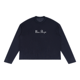 Front view of navy blue raw-edge long sleeve with white New York Cyrillic lettering