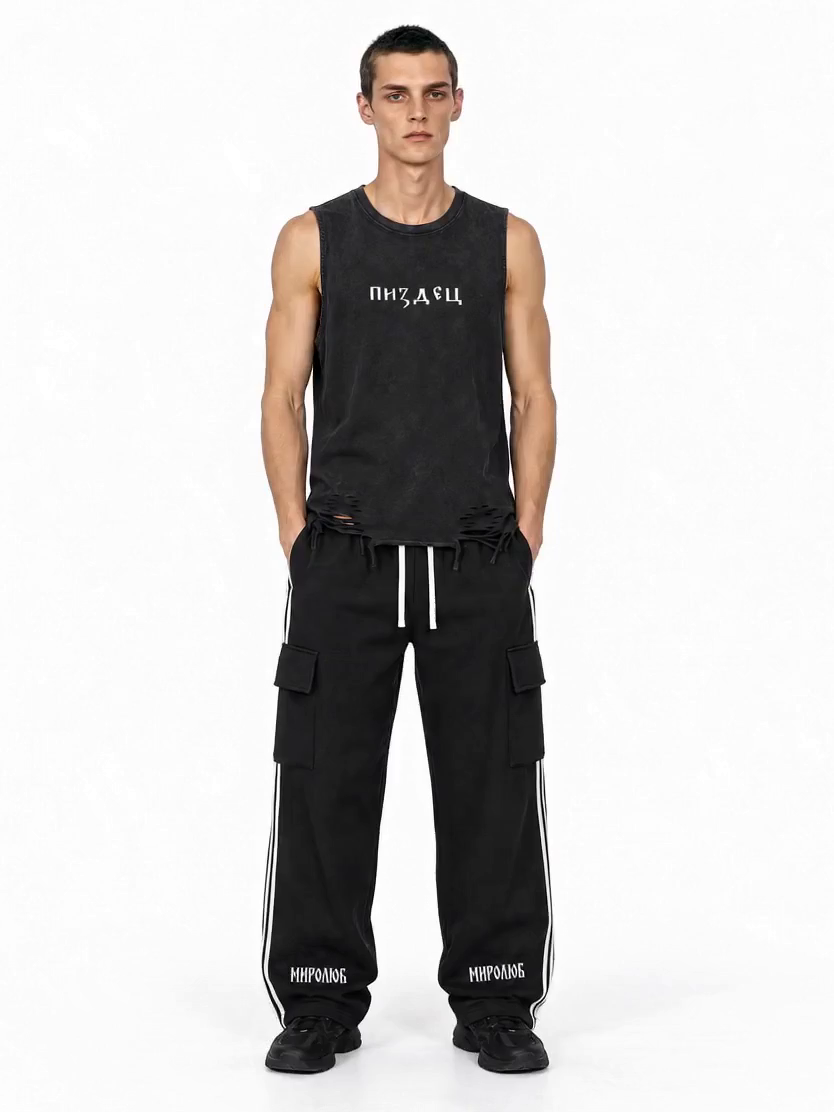 Full-length model wearing Pizdets — Raw-Hem Tank and Wordmark — Side-Stripe Pants