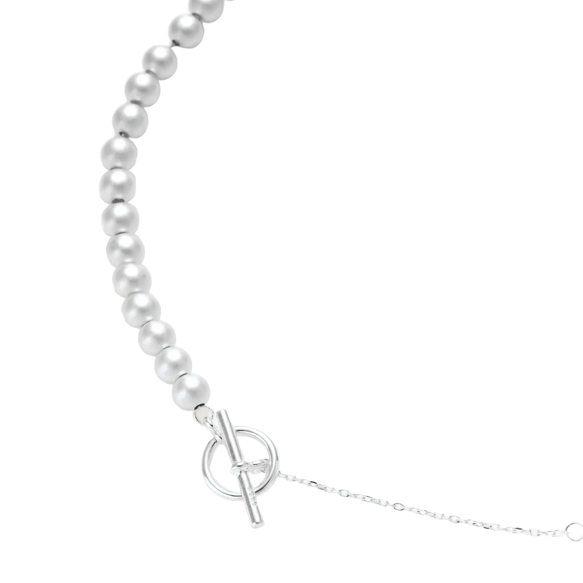 Close-up of Svetislav necklace showing sterling silver beads, a fine chain and a toggle clasp