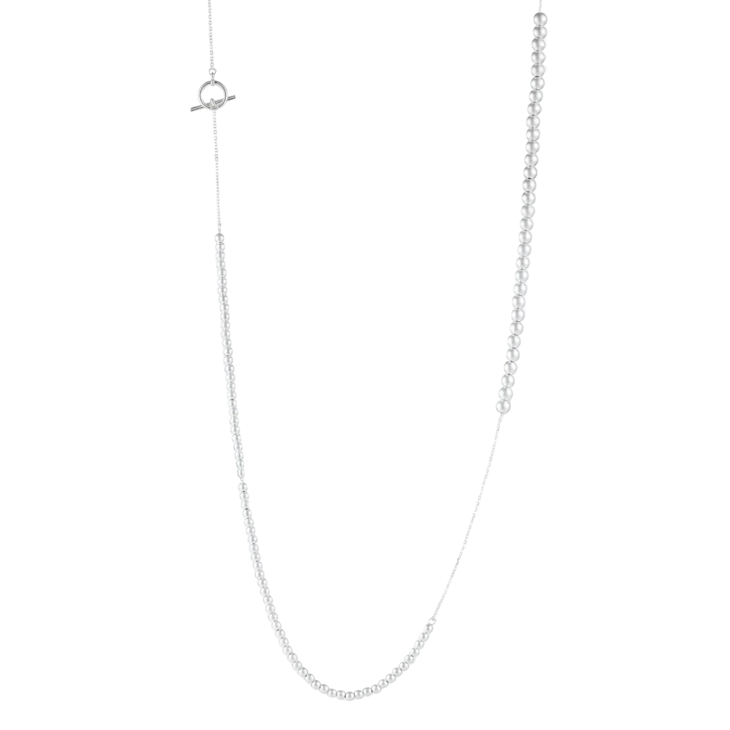 Long view of Svetislav sterling silver necklace with graduated beads and a toggle clasp