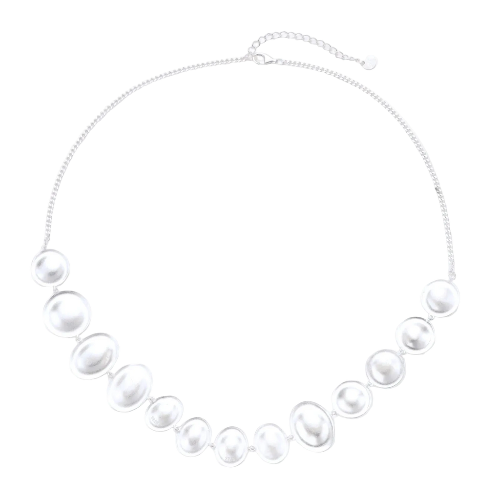 Full view of Svetozar sterling silver disc necklace with a fine chain and adjustable clasp